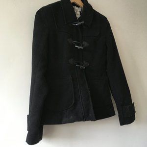 Black peacoat with toggle and zipper closer